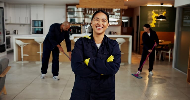 Professional cleaner in Ilford with cleaning equipment